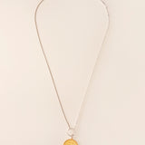 Lange/korte ketting met munt en T-sluiting in zilver