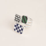 Gespleten ring met een compositie van drie mozaïeken