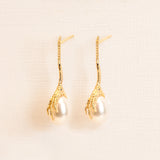 Oorbellen Grigri parel