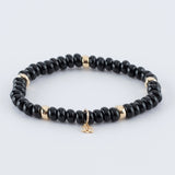 Armband met onyx en 14kt geelgouden bedels